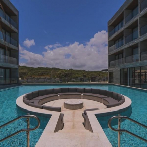 Apartamento em Resort Pé Na Areia Novo